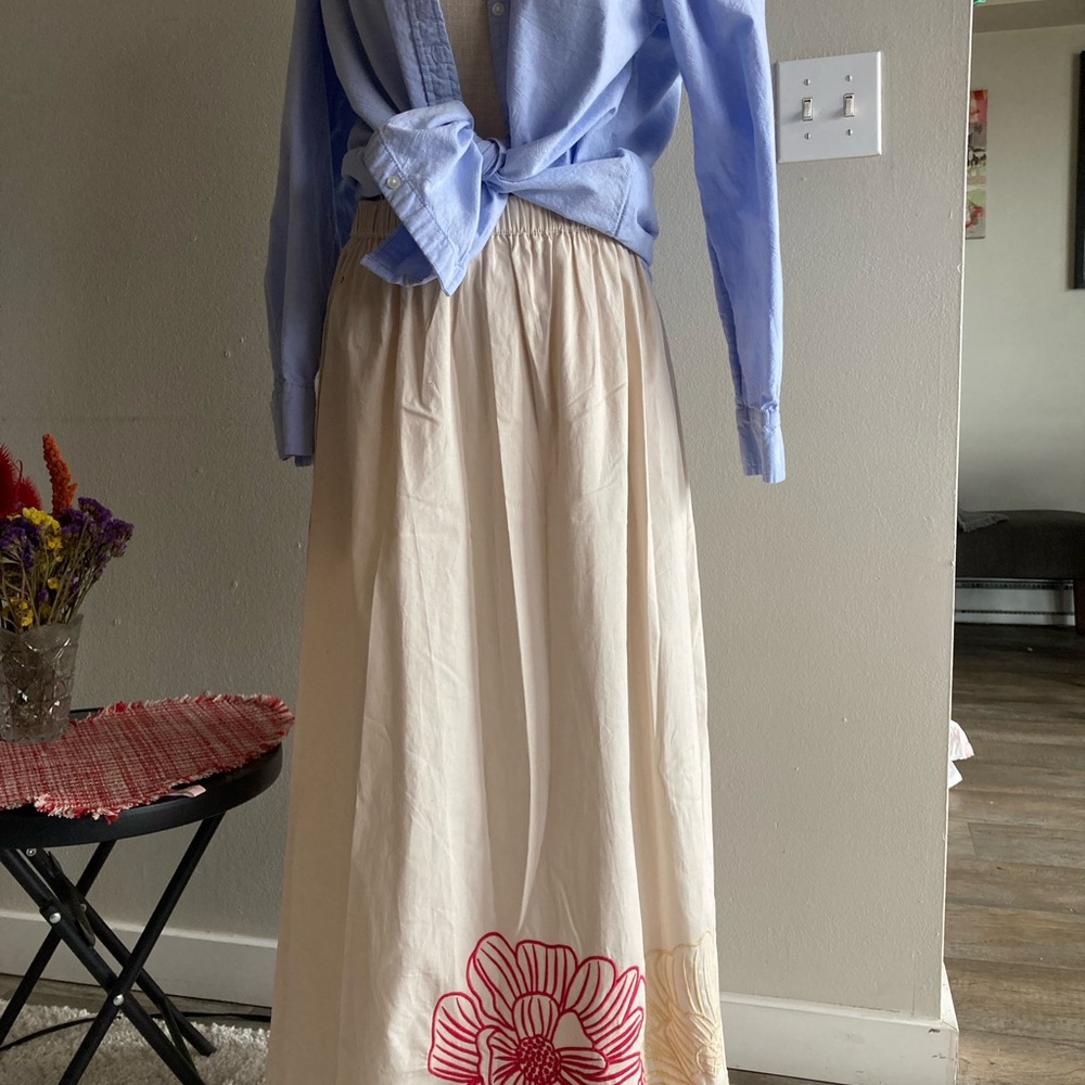 Chic Cream Maxi Skirt with Red Floral Design